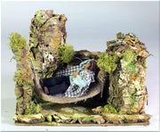 UOMO SULL'AMACA 10CM CON MOVIMENTI 20X14X17CM