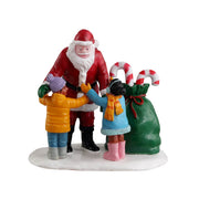 BABBO NATALE CON BIMBI - SANTA GETS A HUG