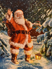 QUADRO NATALIZIO LED CON BABBO NATALE NEL BOSCO 40X30CM CON SENSORE MUSICALE