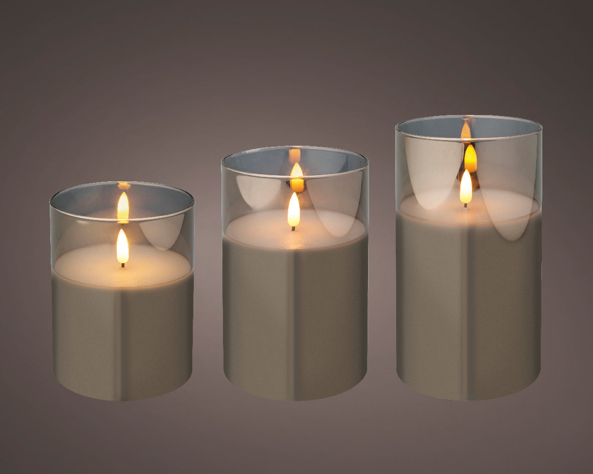 Set di 3 candele decorative a LED, altezza 17,5 cm, colore grigio.