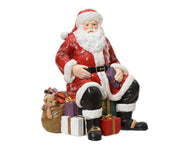 Babbo Natale con regali Seduto Rosso H19cm