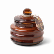 CANDELA IN CONTENITORE IN VETRO AMBRATO PROFUMO CASTAGNO KAKI