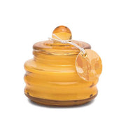 CANDELA IN CONTENITORE IN VETRO ARANCIONE PROFUMO PATCHOULI TABACCO