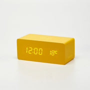 SVEGLIA IN LEGNO LED ROSSI CON FUNZIONE DI RICARICA SMARTPHONE X-ROVER GIALLA