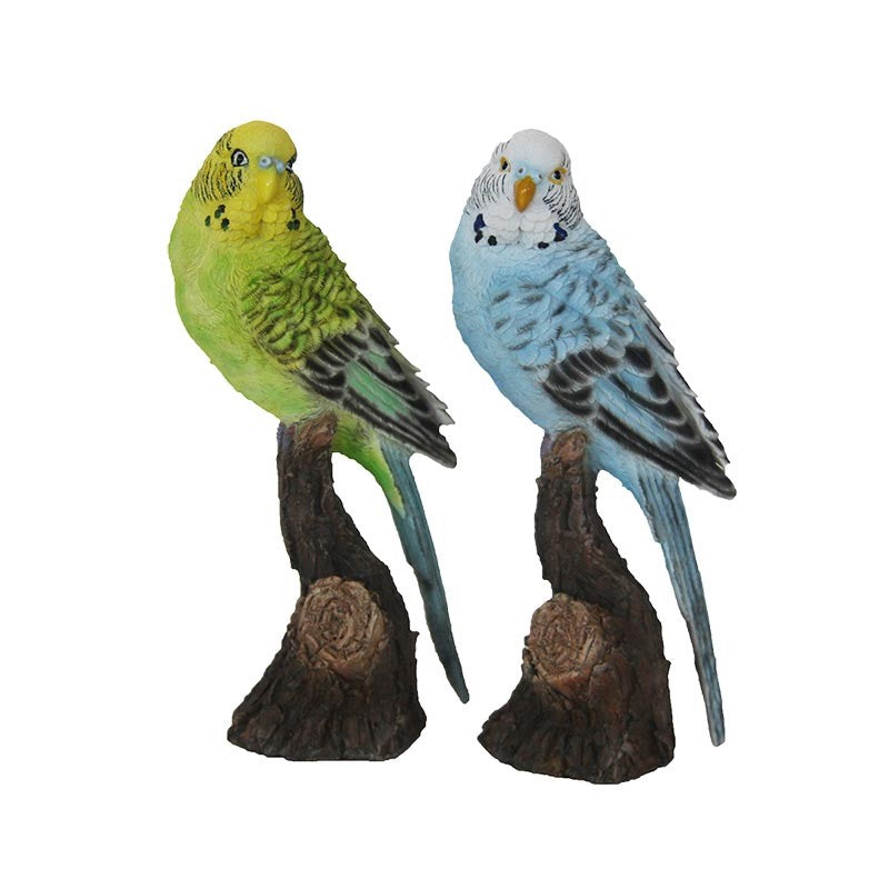 COCORITA SU TRONCO IN RESINA ASSORTITA H18CM